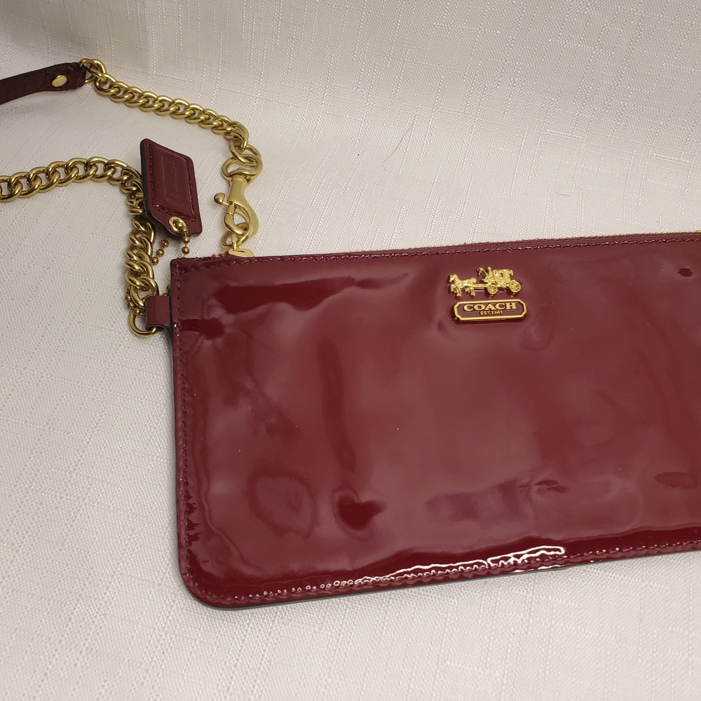 Coach Maroon Patent Leather Wristlet with Gold Chain